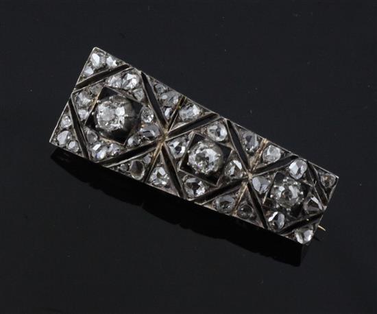 A Victorian gold, silver and diamond brooch, 1.75in.